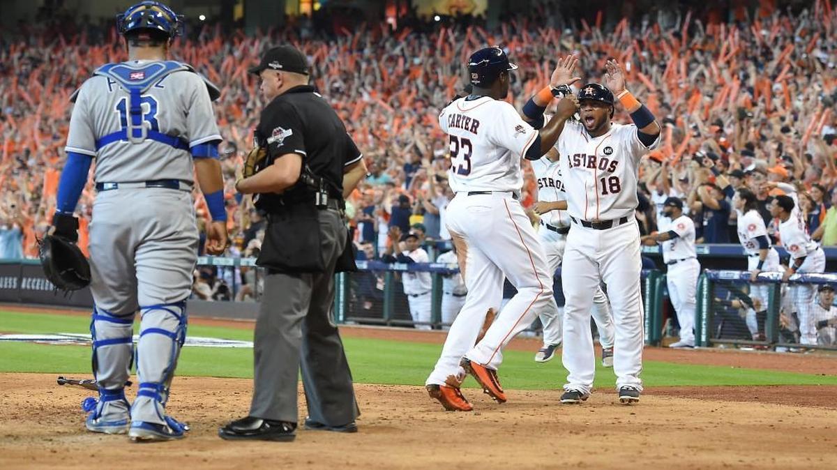 
Houston pulled from behind and took the lead Sunday thanks to a single by catcher Jason Castro in the fifth inning. Celebrating after they both scored on the single were Astros third baseman Luis Valbuena and first baseman Chris Carter. Castro’s single in that inning gave the Astros a 2-1 lead. 


