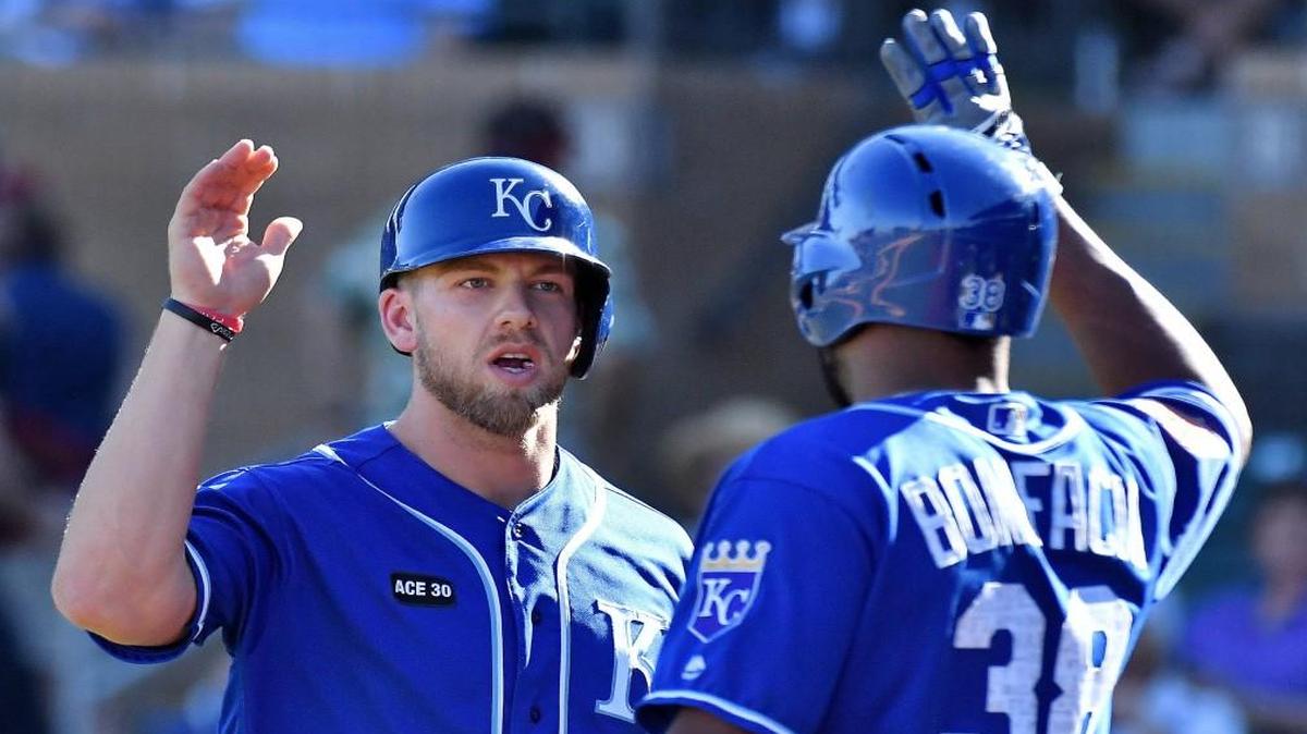 The Royals’ Hunter Dozier was congratulated on his ninth inning home run by Jorge Bonifacio, who homered in the eighth inning during Monday’s spring-training game against the Colorado Rockies in Scottsdale, Ariz.