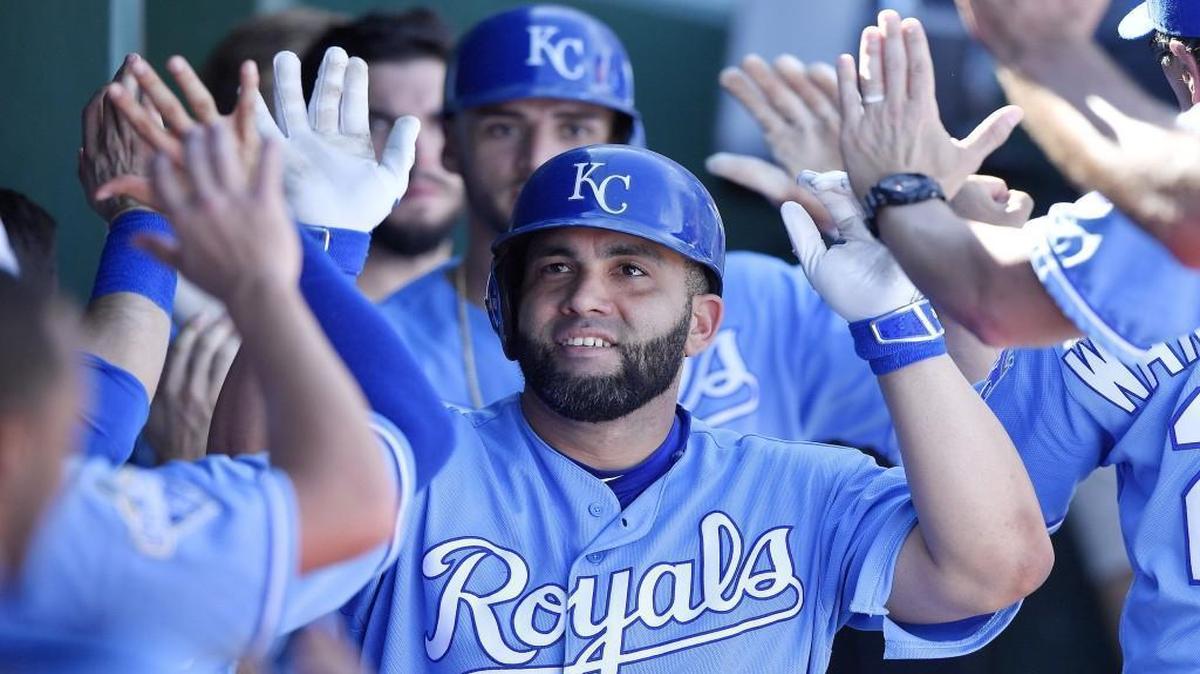 Teammates congratulated Royals designated hitter Kendrys Morales in the dugout after Morales hit a two-run home run in the sixth inning that also scored Paulo Orlando against the Chicago White Sox on Sunday at Kauffman Stadium.