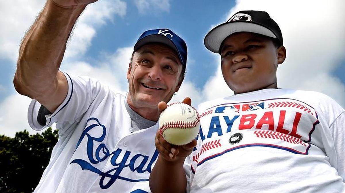 
A tutorial session called Play Ball KC, held Sunday at the Negro Leagues Baseball Museum in Kansas City, was part of an initiative by Major League Baseball to kindle interest in the game among young people. Among the former Royals players helping out was Jim Eisenreich, who offered some pointers to 8-year-old Kyle McClish of Kansas City.


