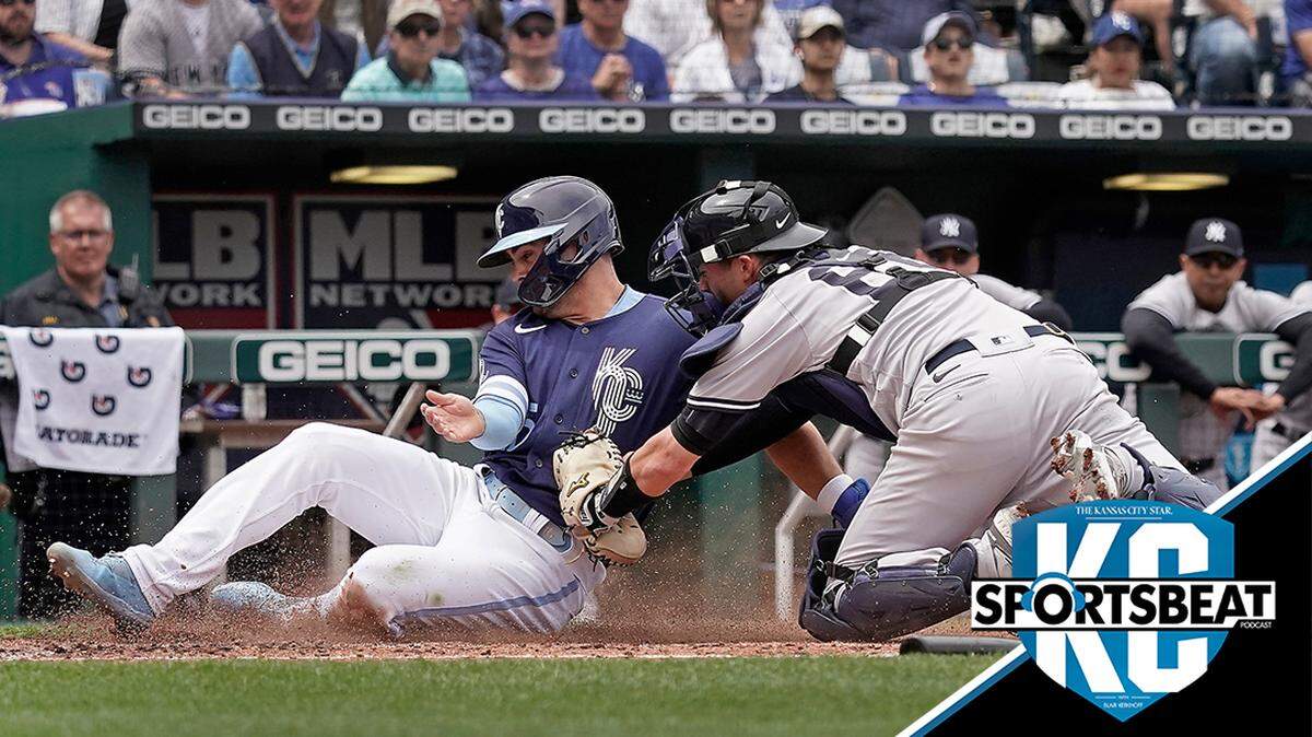 Kansas City Royals’ Whit Merrifield, left, is tagged out by New York Yankees catcher Kyle Higashioka as he tried to score on a fielder’s choice hit by Salvador Perez during the third inning of a baseball game Sunday, May 1, 2022, in Kansas City, Mo. (AP Photo/Charlie Riedel)