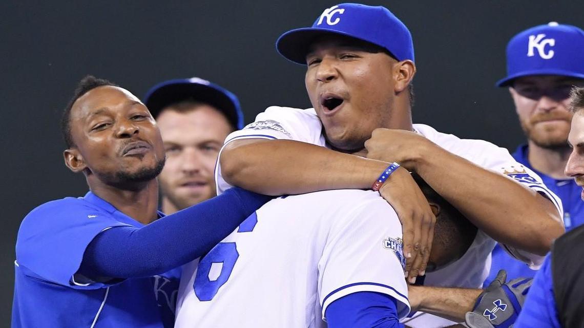 Salvador Perez (center) hugged Lorenzo Cain as the Royals celebrated Cain’s game-winning single scored Christian Colon in the 14th inning to lift Kansas City to a 3-2 win over the Chicago White Sox on Wednesday night at Kauffman Stadium.
