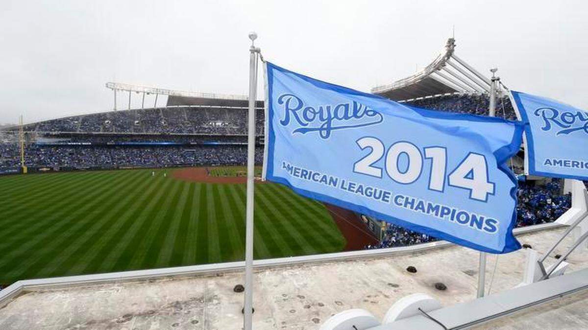 
The newly hoisted 2014 AL championship banner flew Monday, April 6, 2015, during the Kansas City Royals season opening game with the Chicago White Sox at Kauffman Stadium.
