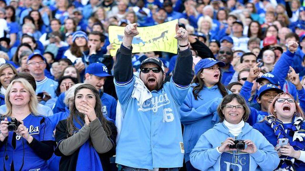 
Fans brought their signs of support and cheered during Thursday’s 2014 Season Celebration by the Kansas City Royals at Kauffman Stadium.
