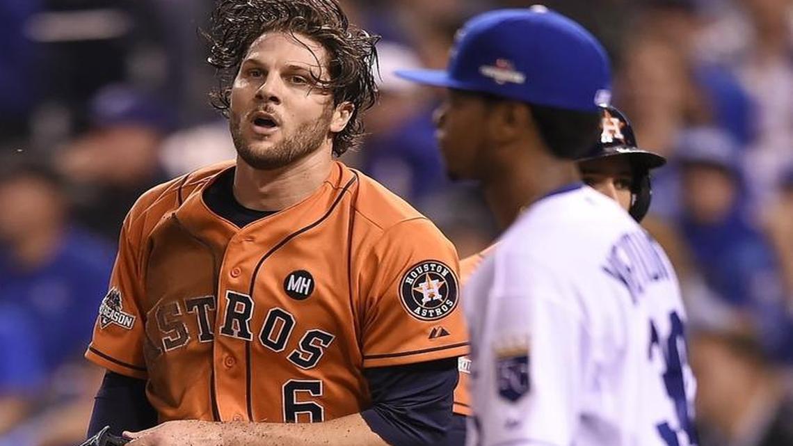 
Houston Astros center fielder Jake Marisnick stood up after sliding into home for a run in the second inning as Kansas City Royals starting pitcher Yordano Ventura walked back to the mound during Thursday’s ALDS opener in Kansas City, Mo.
