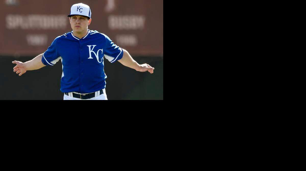 
Kansas City Royals pitcher Kris Medlen stretches during Sunday's spring training workout for the Royals on February 22, 2015 in Surprise, Ariz.
