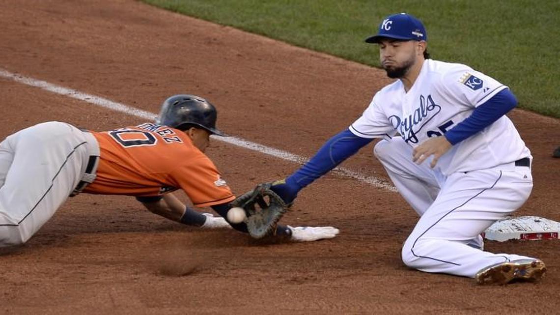 
Royals first baseman Eric Hosmer catches the ball and put the tag on Astros Carlos pinch runner Gomez in the ninth inning of Friday's ALDS baseball game at Kauffman Stadium. The Royals beat the Astros 5-4 and tied the series.
