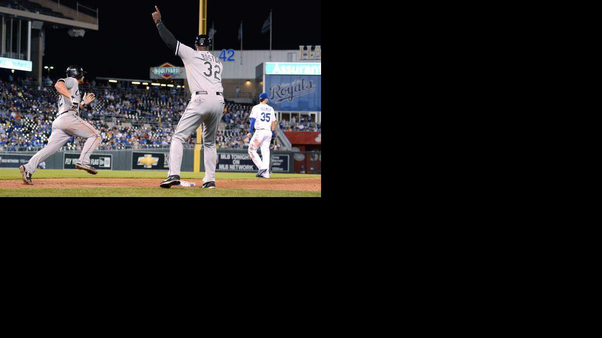 
Chicago’s Conor Gillaspie (12) rounded first base on a three-run triple in the seventh inning against the Royals on Tuesday night at Kauffman Stadium.
