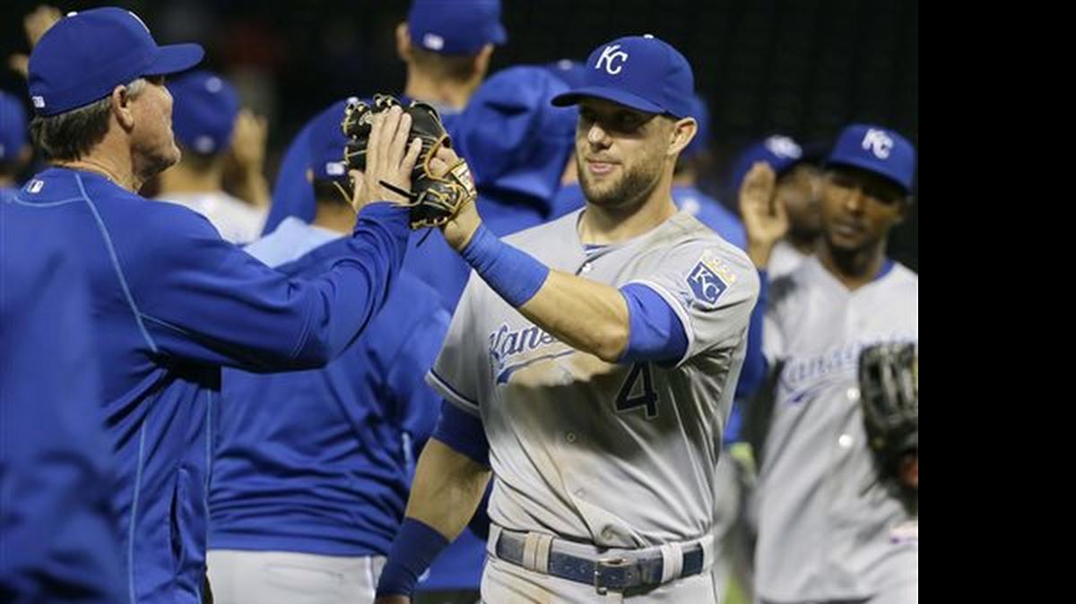 
Kansas City Royals left fielder Alex Gordon (4) is congratulated by manager Ned Yost, left, after the final out in baseball game against the Texas Rangers in Arlington, Texas, Tuesday, May 12, 2015. The Royals won 7-6 in 10 innings. (AP Photo/LM Otero)
