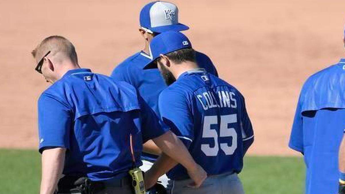 
Kansas City Royals pitcher Tim Collins was escorted off the field after suffering discomfort in his throwing arm on March 4 against the Texas Rangers in Surprise, Ariz.
