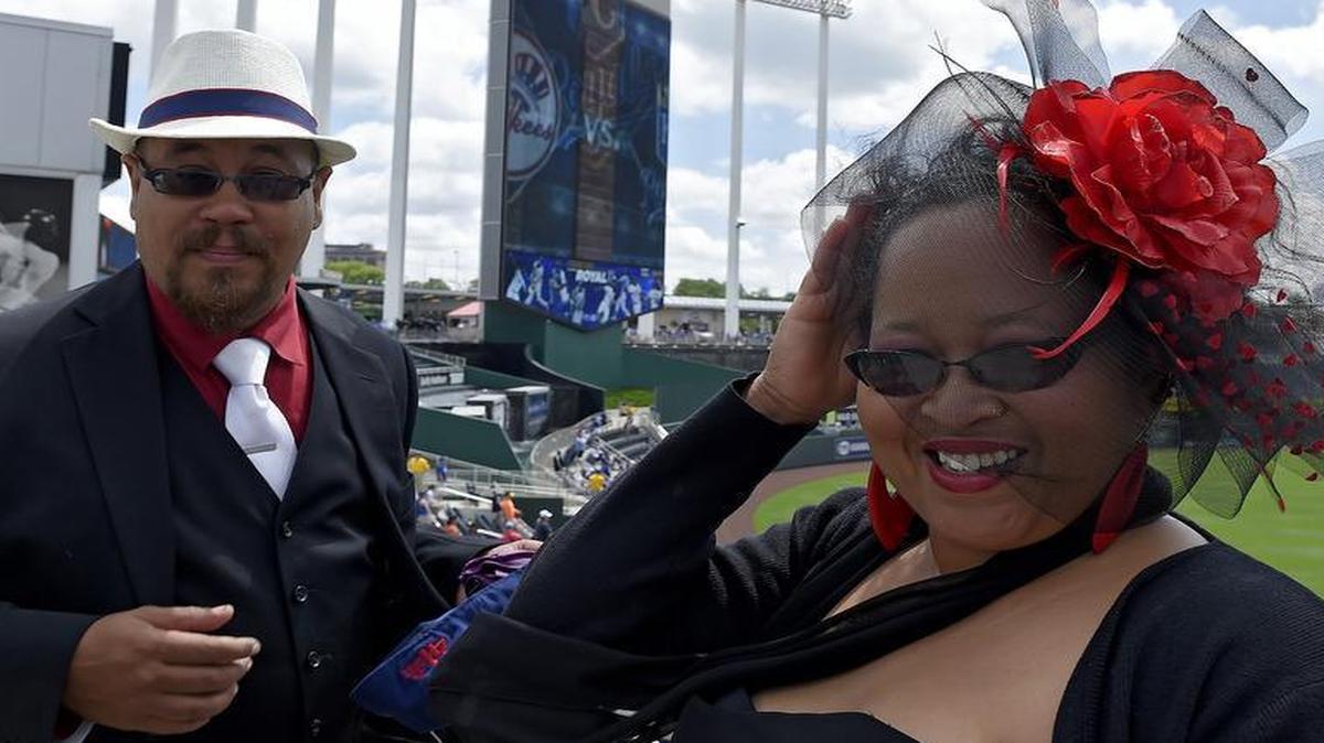 
Marvin and Christi Francois of Kansas City got in the spirit of “Dressed to the Nines Day at the K” before Sunday’s game between the Royals and Yankees at Kauffman Stadium. The game also featured players wearing uniforms to honor the Negro Leagues.
