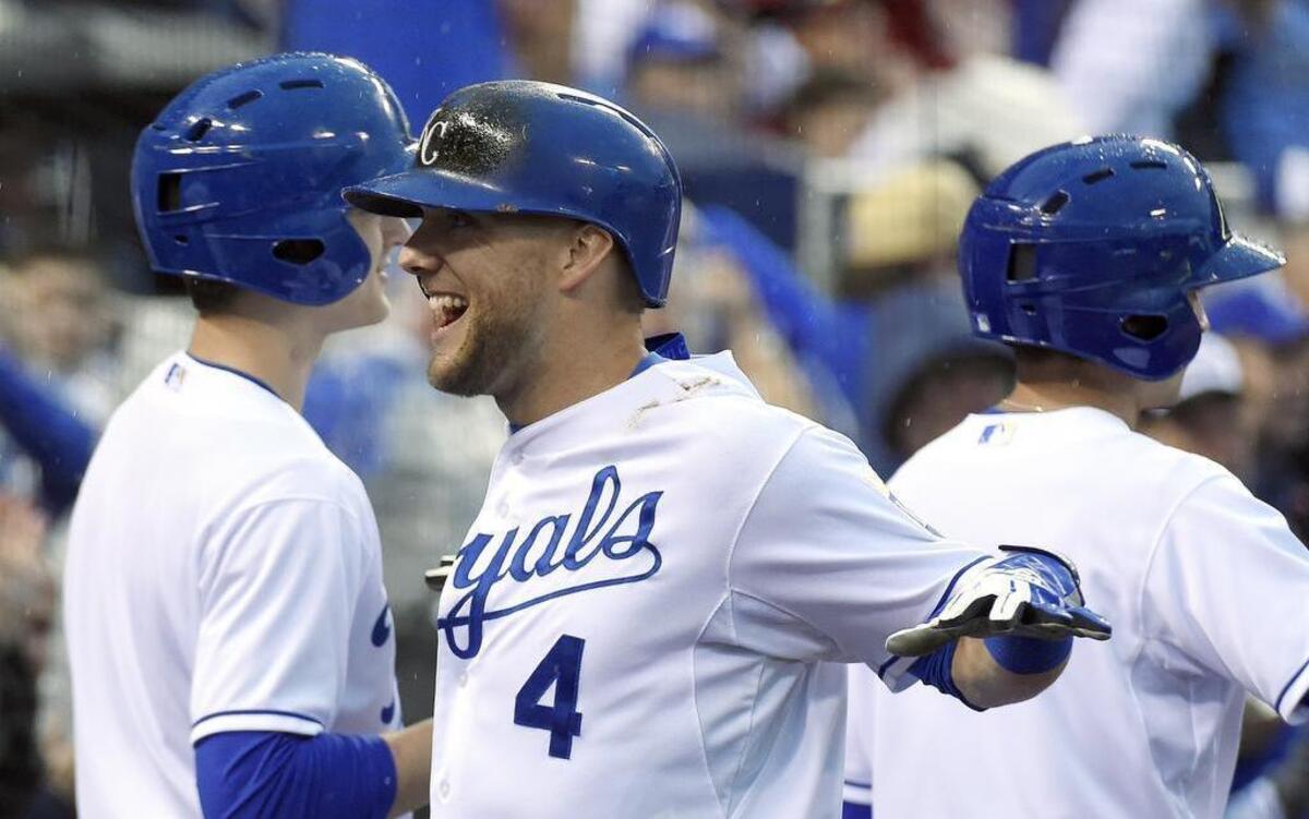 
The Royals’ Alex Gordon (4) celebrated his second-inning two-run home, which helped Kansas City to a 3-2 win over the St. Louis Cardinals on Saturday night at Kauffman Stadium in a game that was called after five-and-a-half innings because of rain.
