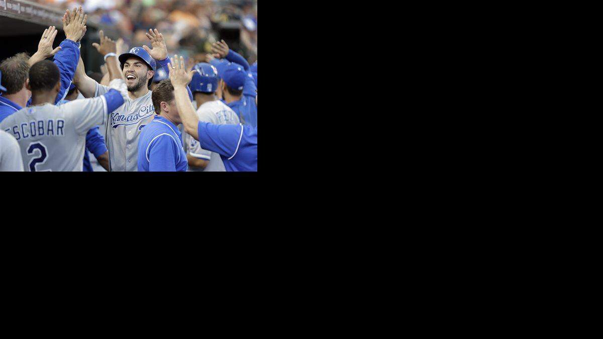 
Kansas City Royals' Eric Hosmer celebrates with teammates after scoring on a Billy Butler three-run double in the fifth inning of a baseball game in Detroit, Monday, June 16, 2014.
