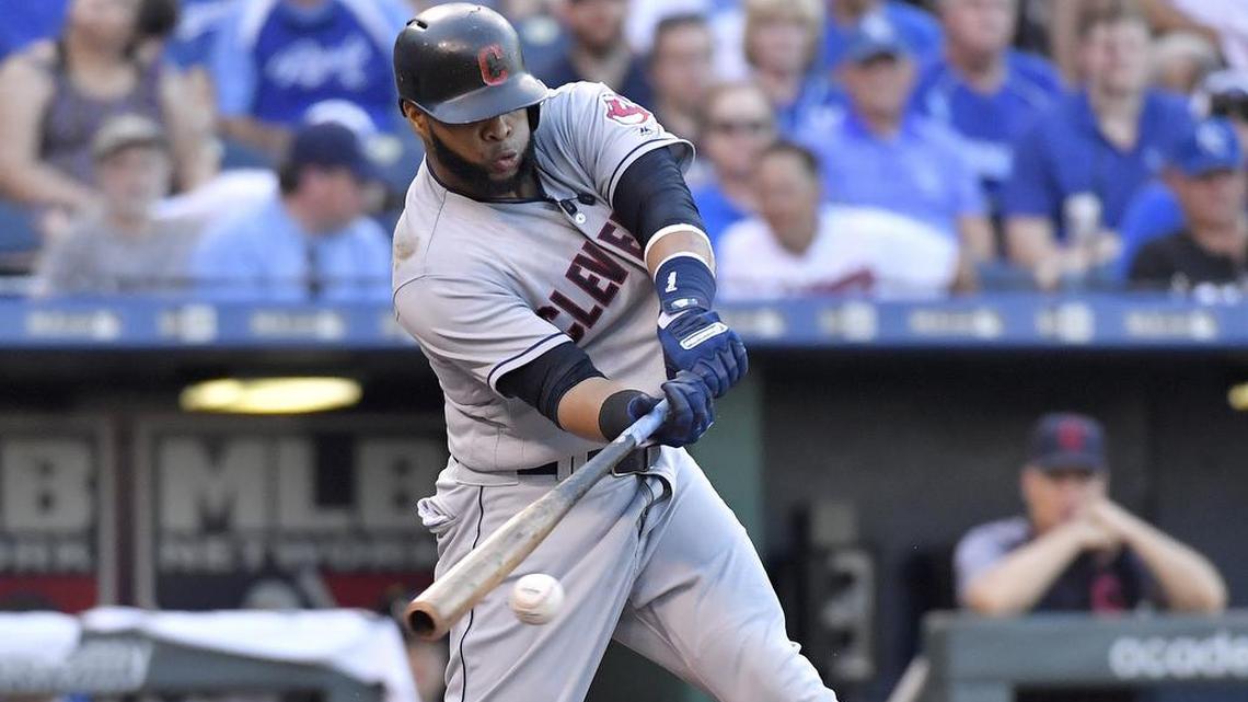 Cleveland Indians’ Carlos Santana connects on a single in the fourth inning during Saturday’s baseball game against the Kansas City Royals at Kauffman Stadium in Kansas City, Mo.