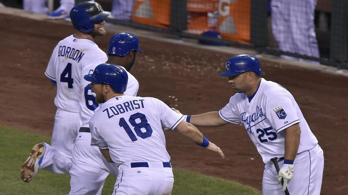 
New designated hitter Kendrys Morales (left) has added 22 home runs to a Royals lineup that has scored at least 100 more runs and hit 40 more homers than last season.
