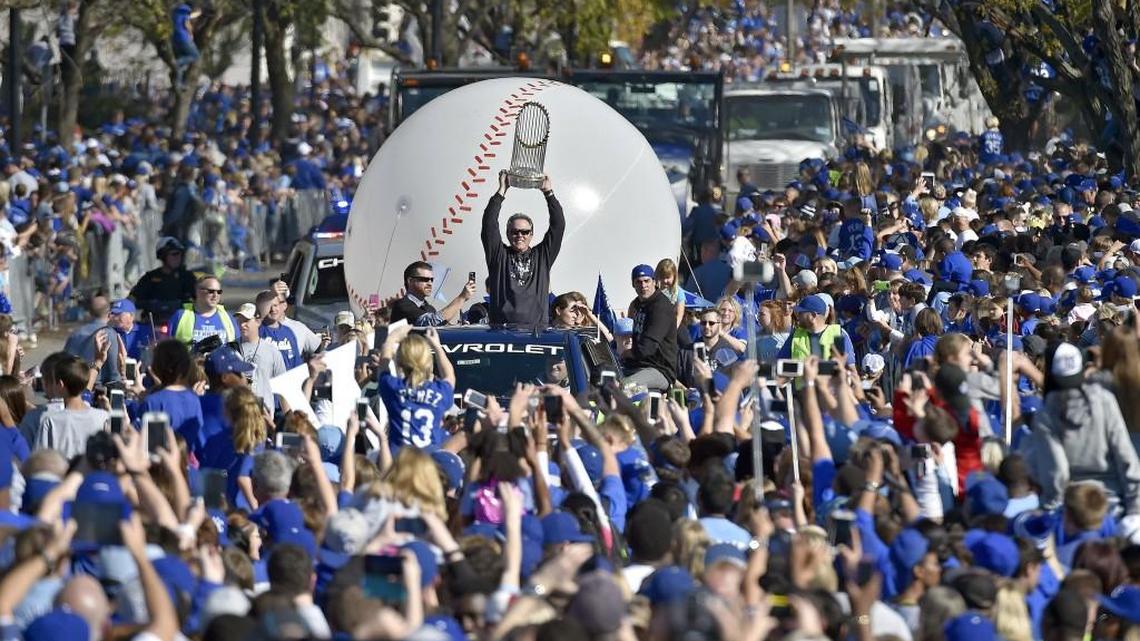 Kansas City Royals manager Ned Yost carries the trophy during the Kansas City Royals’ World Series parade and celebration on November 3, 2015 at Union Station in Kansas City, Mo.