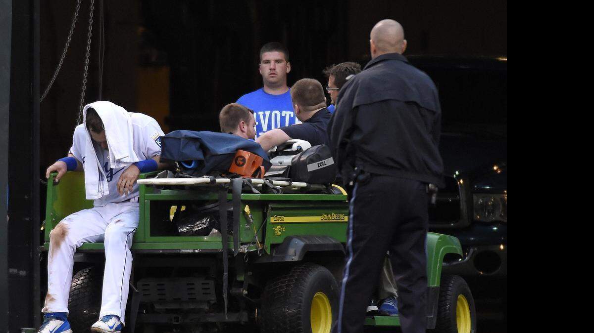Royals left fielder Alex Gordon (4) was taken off the field on a cart after being injured chasing a fly ball by Tampa Bay Rays second baseman Logan Forsythe in the fourth inning Wednesday night at Kauffman Stadium. The Royals later said Gordon injured his left groin on the play. Forsythe scored on an inside-the-park home run.
