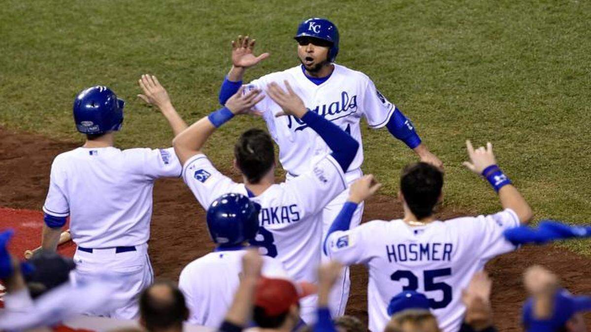 
Royals second baseman Omar Infante was pumped as he greeted teammates after scoring off a double by Alcides Escobar in the second inning Wednesday. 
