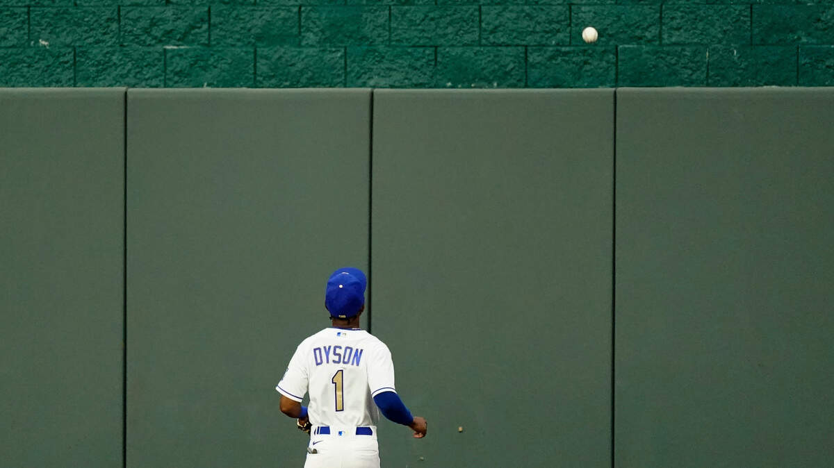 Kansas City Royals center fielder Jarrod Dyson watches a solo home run hit by St. Louis Cardinals’ Tyler O’Neill during the fourth inning of Friday’s game in Kansas City, Mo.