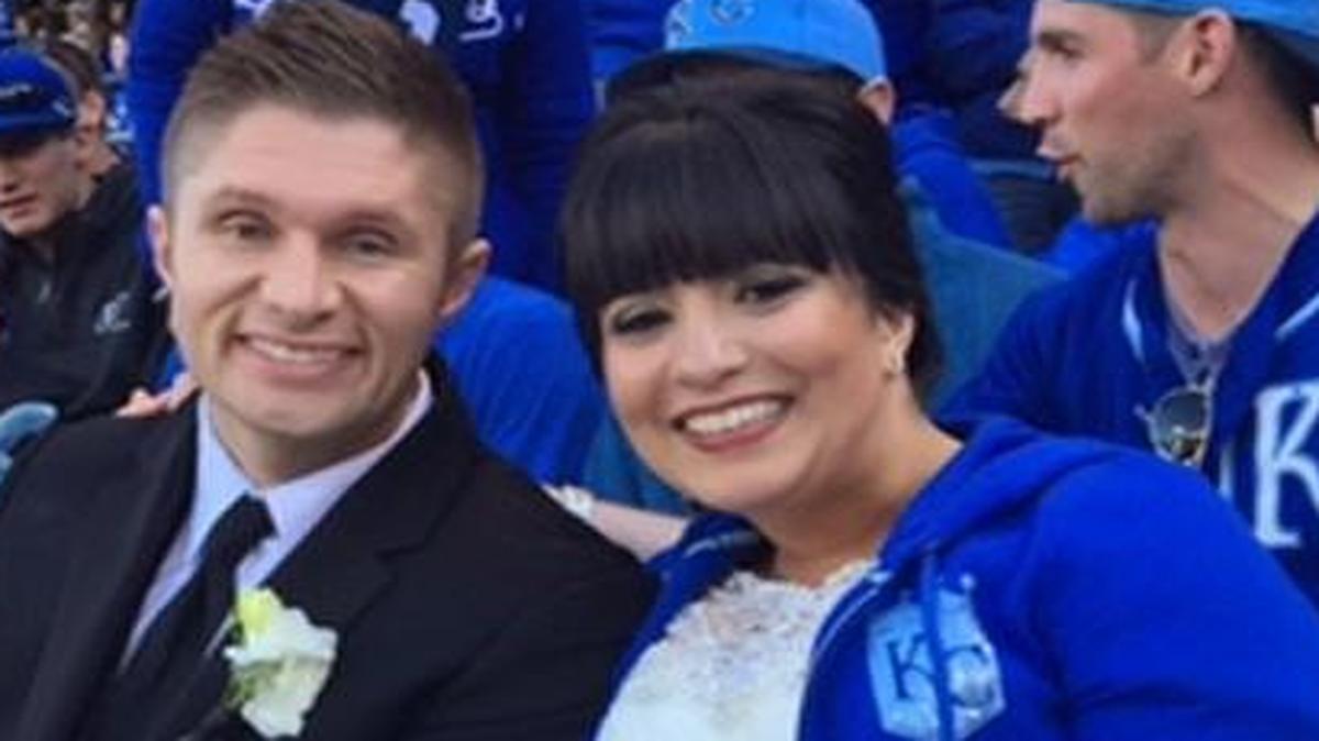 
Kyle Kovach and Tricia Freeman, between their wedding and reception, stopped by to watch a few innings of the Royals game.
