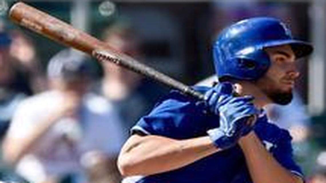 
Royals first baseman Eric Hosmer (35) singled to drive in second baseman Christian Colon against the Arizona Diamondbacks in Cactus League action Saturday in Scottsdale, Ariz.
