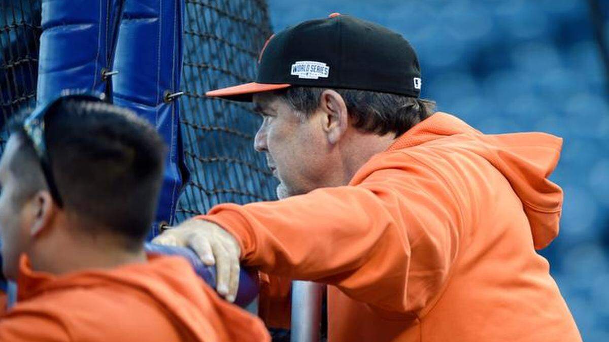 
Giants manager Bruce Bochy watches his team take batting practice during the World Series media day on Monday at Kauffman Stadium.

