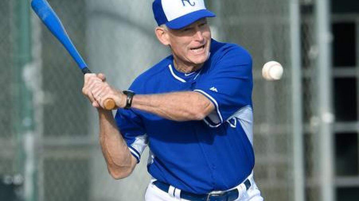 Former Kansas City Royals player and manager John Wathan hits grounders for the infielders during Saturday’s spring training workout for the Royals on February 21, 2015 in Surprise, Ariz.