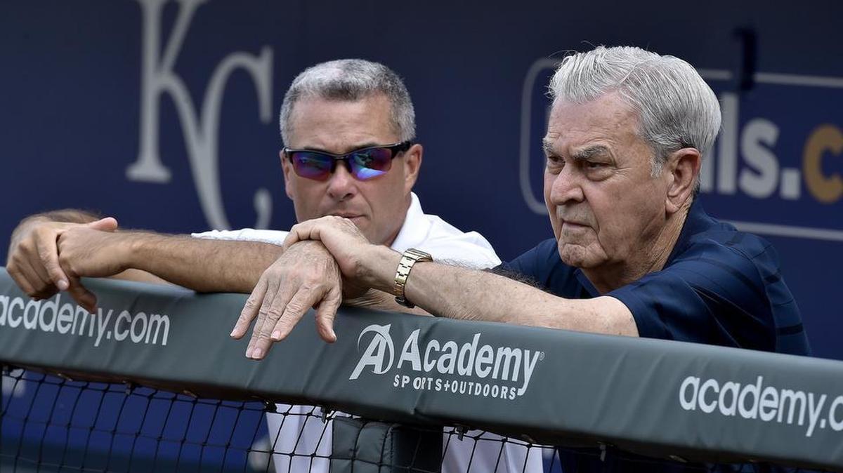 Royals general manager Dayton Moore (left) and owner David Glass