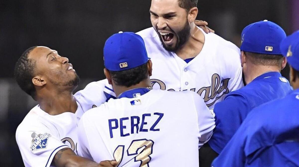 Kansas City Royals' Eric Hosmer celebrates his game winning walk off hit in the 11th inning for a 5-4 win over the Minnesota Twins early Saturday morning at Kauffman Stadium in Kansas City, Mo. The game started on Friday and both teams endured a three hour rain delay before resuming the fifth inning at 11:45 p.m.