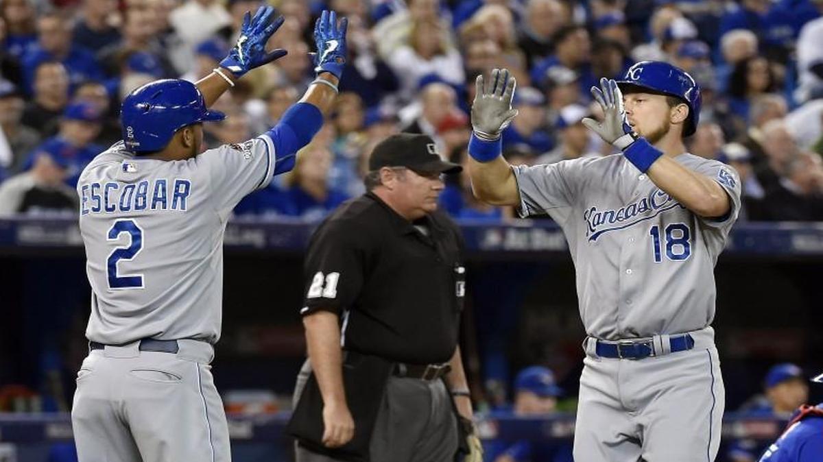 Royals shortstop Alcides Escobar and second baseman Ben Zobrist met at home plate after Zobrist drove in Escobar with a home run in the first inning Tuesday.