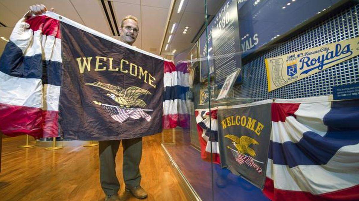 
The World Series bunting happily held Thursday by Kauffman Stadium’s Curt Nelson atones for a pilfering that a Wisconsin student committed during the 1985 World Series. The swiper, Jerry Kuehl, now age 50, recently returned the item to the Royals. 
