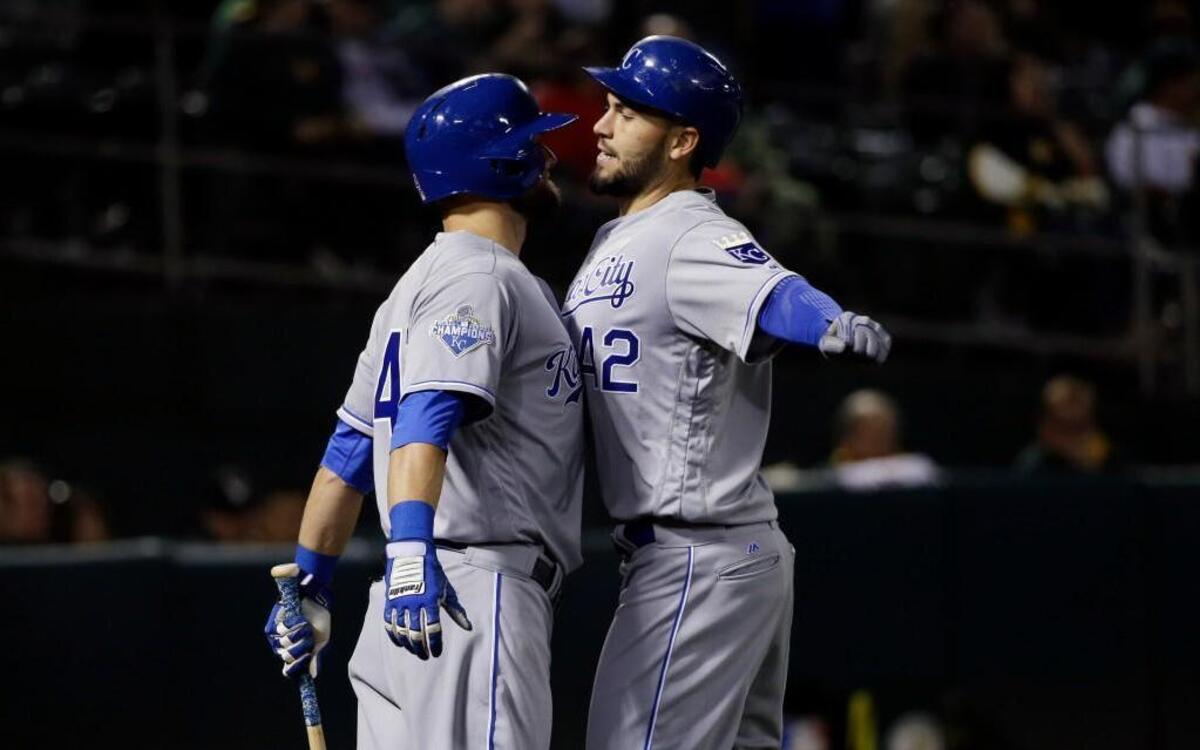 The Royals’ Eric Hosmer (right) celebrated with Alex Gordon following Hosmer’s solo home run against the Athletics in the ninth inning Friday in Oakland.