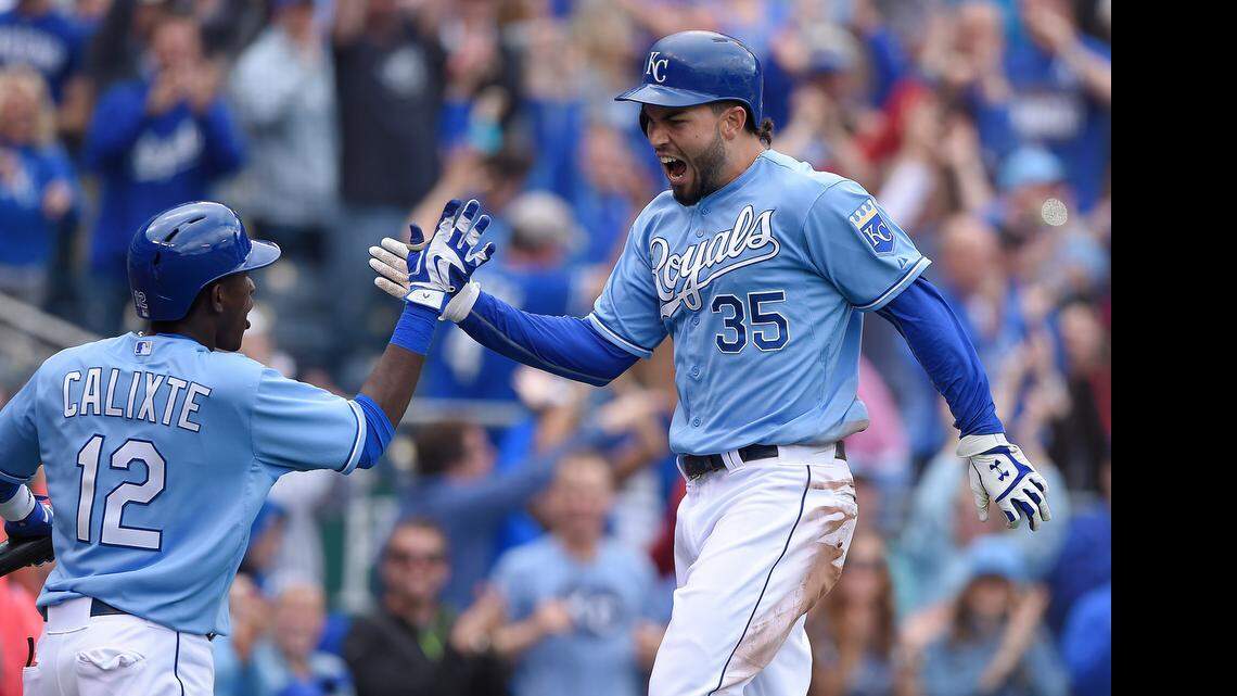 
Kansas City Royals' Eric Hosmer (35) celebrates with Orlando Calixte (12) after Hosmer scored on a two run double by Kendrys Morales in the eight inning during Sunday's baseball game against the Oakland Athletics on April 19, 2015 at Kauffman Stadium in Kansas City, Mo.
