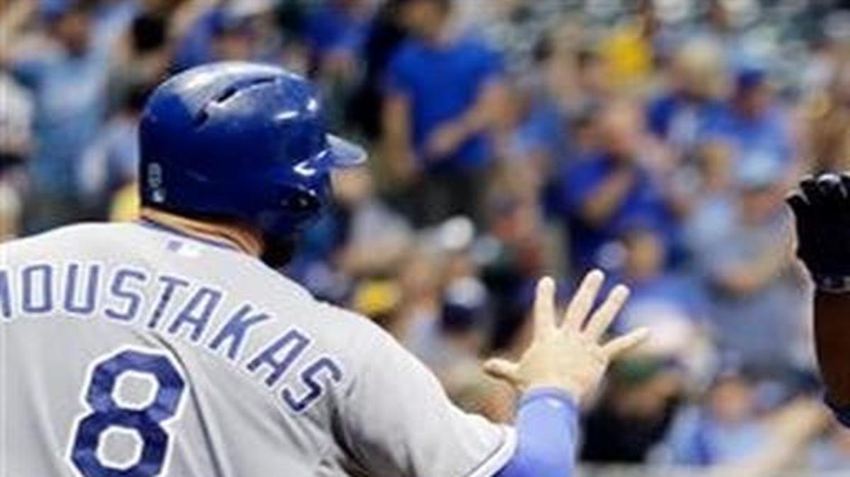 
The Royals' Lorenzo Cain is congratulated by Mike Moustakas after hitting a two-run home run during the fifth inning of Monday’s baseball game against the Brewers in Milwaukee.
