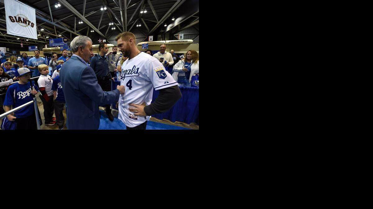 
David Glass (left) gives a playful punch to Alex Gordon during Friday's Kansas City Royals Fanfest on January 30, 2015, at Bartle Hall in Kansas City, Mo.
