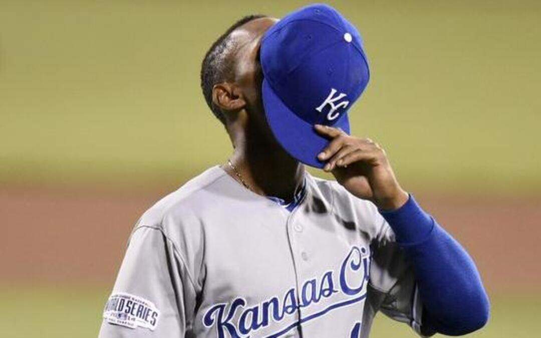 Kansas City Royals center fielder Jarrod Dyson (1) covers his face with his cap during Saturday's Kansas City Royals and San Francisco Giants Game 4 of the World Series at AT&T Park on Oct. 25, 2014 in San Francisco, California.