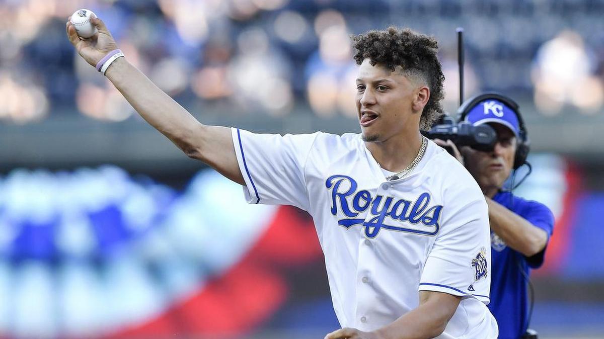 Chiefs quarterback Patrick Mahomes throws out the first pitch before a 2018 Royals game at Kauffman Stadium.