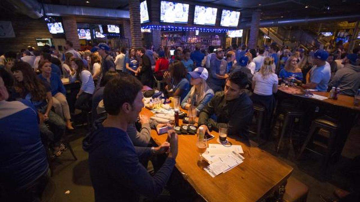 Patrons watch Game 1 of the 2014 World Series at Westport Ale House.