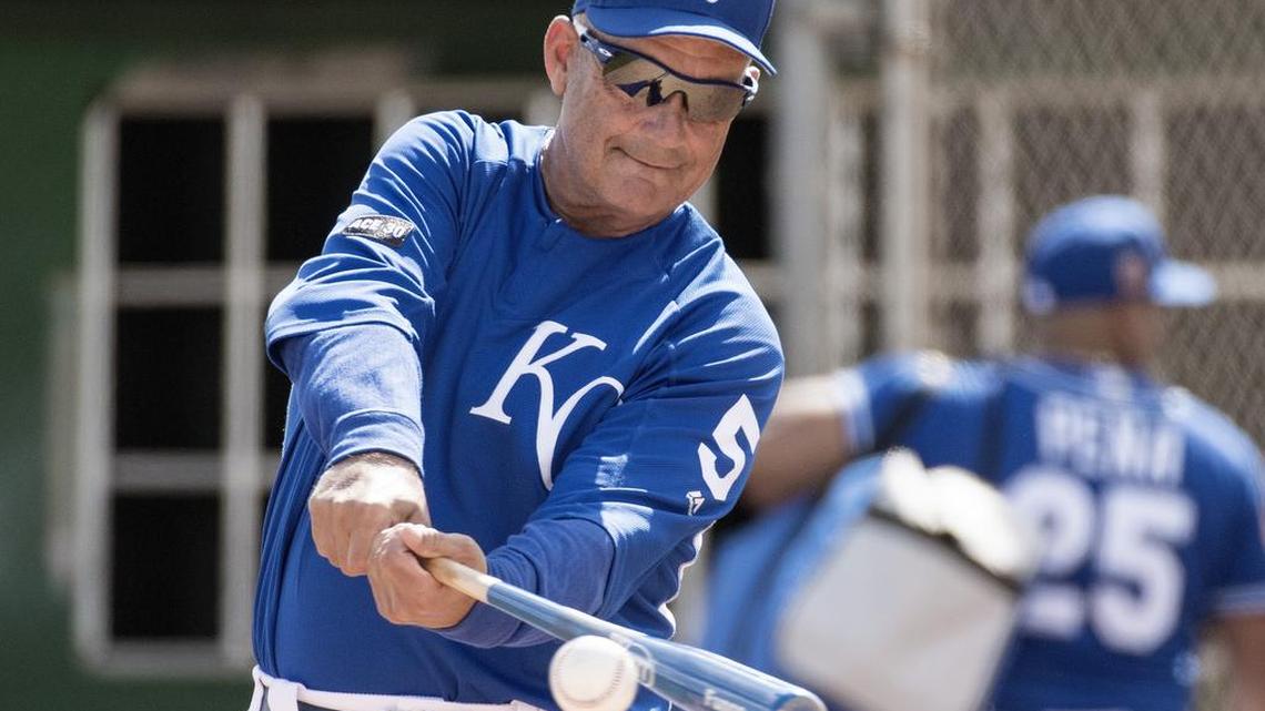 Kansas City Royals Hall of Fame player George Brett helps out during a spring training workout in Surprise, Arizona.