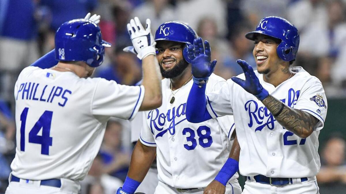 Kansas City Royals’ Adalberto Mondesi is congratulated by Jorge Bonifacio and Brett Phillips after Mondesi hit a three run home run in the seventh inning during Wednesday’s baseball game against the Chicago Cubs on August 8, 2018 at Kauffman Stadium in Kansas City, Mo.