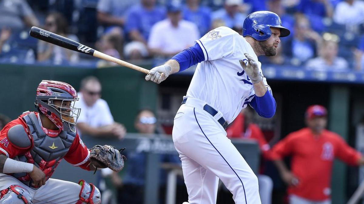 Kansas City Royals' Lucas Duda follows through on an RBI single to score Hunter Dozier in the fourth inning during Monday's baseball game against the Los Angeles Angels on June 25, 2018, at Kauffman Stadium in Kansas City, Mo.