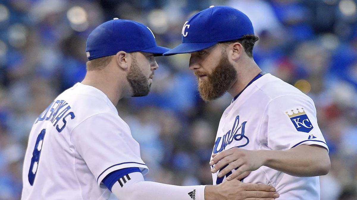 Royals pitcher Danny Duffy (right) got a pat from third baseman Mike Moustakas while waiting to be relieved in the second inning against the Cleveland Indians on May 6 at Kauffman Stadium.