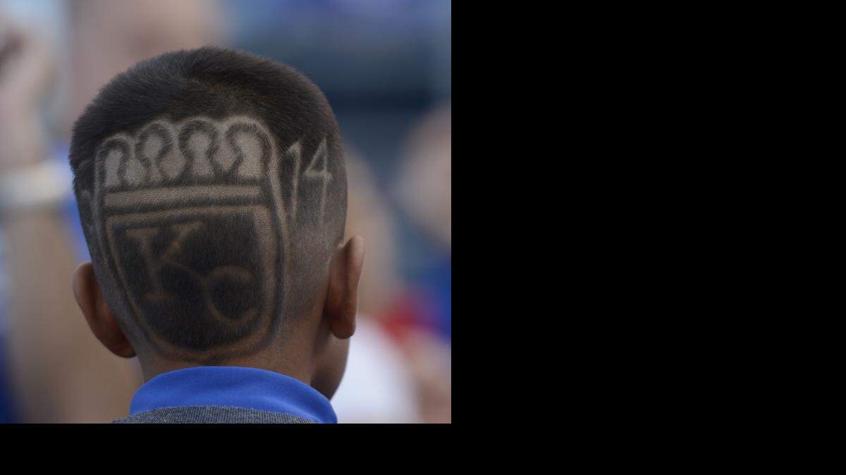 
Kaden Patel 12 of Grain Valley was in the spirit of things with his haircut in support for the Royals during batting practice prior to the stat of game two of the World Series on Wednesday, October 22, 2014 at Kauffman Stadium in Kansas City, Mo.
