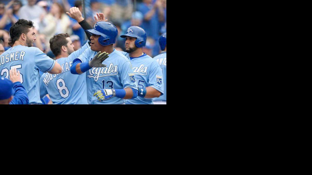 
Kansas City Royals' Salvador Perez (13) celebrates his two run home run with Eric Hosmer in the sixth inning during Thursday's baseball game against the Chicago White Sox on April 9, 2015 at Kauffman Stadium in Kansas City, MO.
