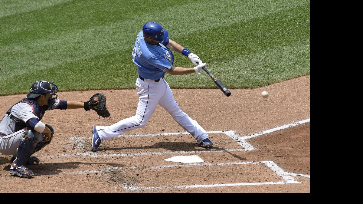 
The Royals' Drew Butera (9) connected on an RBI single in front of Minnesota Twins catcher Kurt Suzuki (8), scoring Omar Infante in the third inning on July 5, 2015, at Kauffman Stadium.
