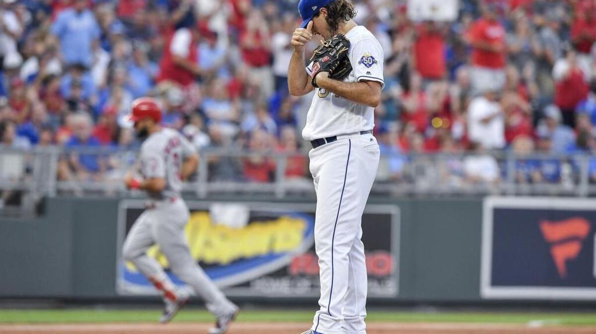 Kansas City Royals starting pitcher Burch Smith wait for St. Louis Cardinals’ Matt Carpenter to round the bases on a two run home run in the second inning during Friday’s baseball game on August 10, 2018 at Kauffman Stadium in Kansas City, Mo.