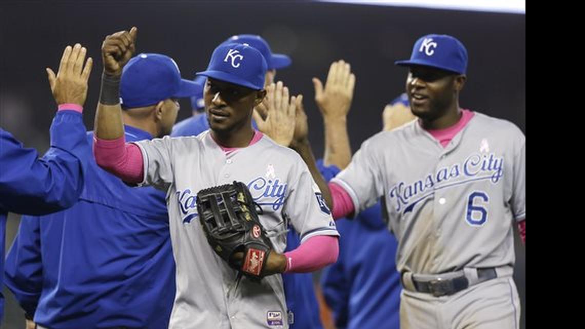 
Kansas City Royals right fielder Jarrod Dyson, left, and Lorenzo Cain celebrate their 2-1 win over the Detroit Tigers after the tenth inning of a baseball game, Monday, May 11, 2015, in Detroit. (AP Photo/Carlos Osorio)
