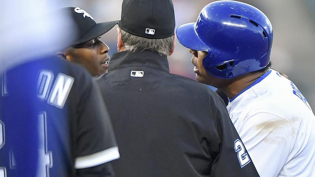 Kansas City Royals’ Salvador Perez and Chicago White Sox shortstop Tim Anderson exchange words at second in the bottom of the first inning as the benches cleared during Saturday’s second baseball game of a doubleheader on April 28, 2018, at Kauffman Stadium in Kansas City, Mo.