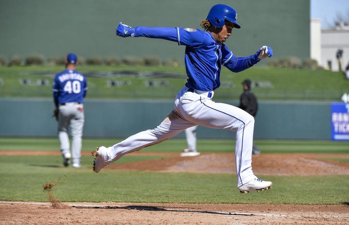 Kansas City Royals’ Adalberto Mondesi scores in the third inning on a single by Alex Gordon during Saturday’s spring training baseball game against the Texas Rangers on February 23, 2019 at Surprise Stadium in Surprise, AZ.