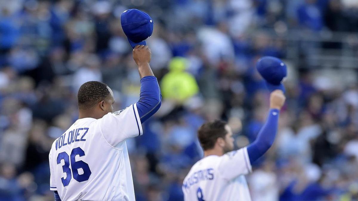 Royals starting pitcher Edinson Volquez and third baseman Mike Moustakas tipped their hats to left fielder Alex Gordon after he made a diving catch for an out in the fourth inning Thursday at Kauffman Stadium.